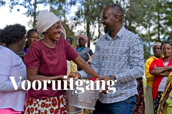 DGB Group prepares for Article 6 approval in Kenya_DGB team member and a local woman during cookstoves distribution_visual 1_NL