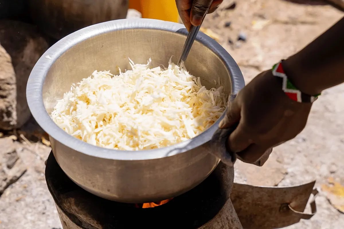 Ensuring impact, Kitchen performance testing for DGBs cookstoves_Close-up of lunch being prepared_visual 3