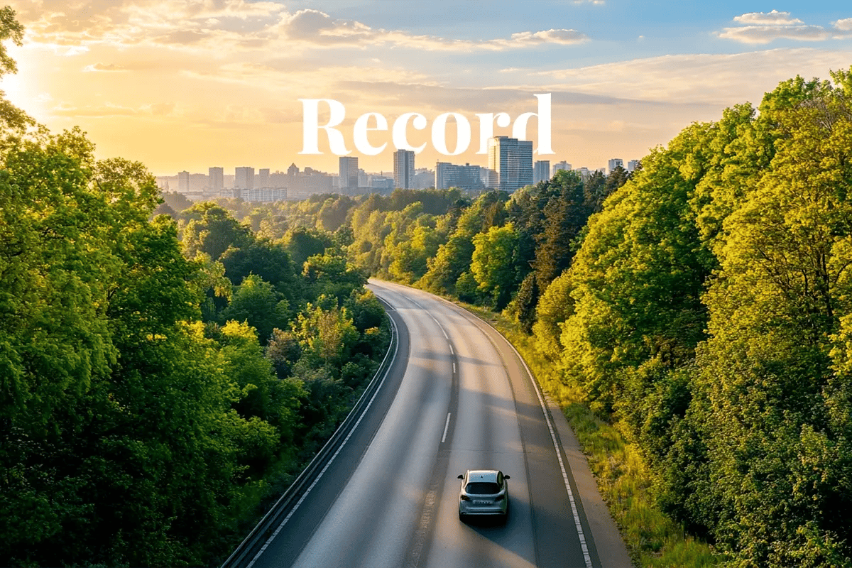 Historic year for Germany $19b earned in emissions trading_An electric car driving along a country road in Germany, surrounded by a lush green forest, with modern buildings visible in the distant background_vis