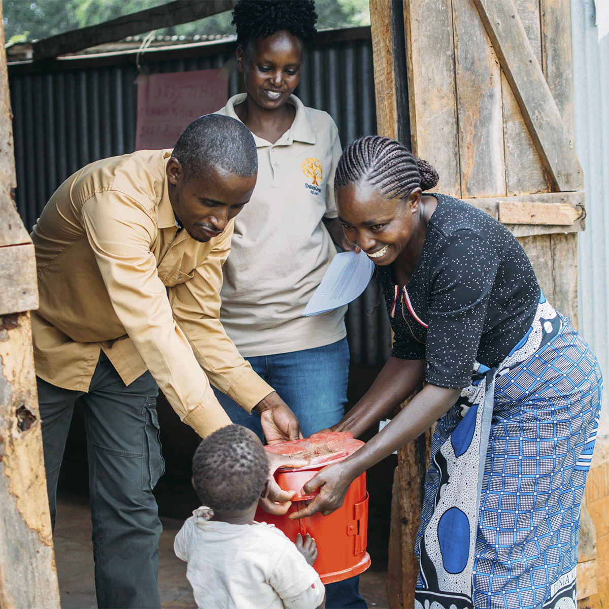 Hongera Energy Efficient Cookstoves Project_a local family receiving an energy-efficient cookstove