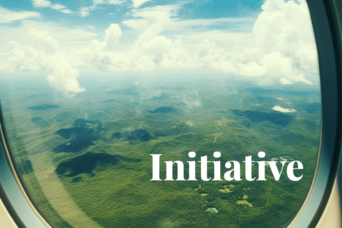 Lufthansa Group collaborates with Airbus for carbon neutrality initiative_View from a plane of mountains and forest landscape_visual 1