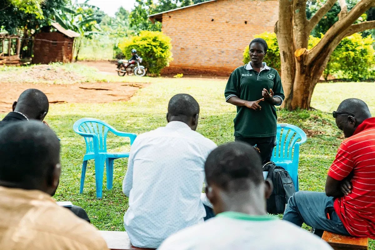 Rooting for impact, Preparing farmers for the planting season in Bulindi_A group of farmers attending a training session_visual 3