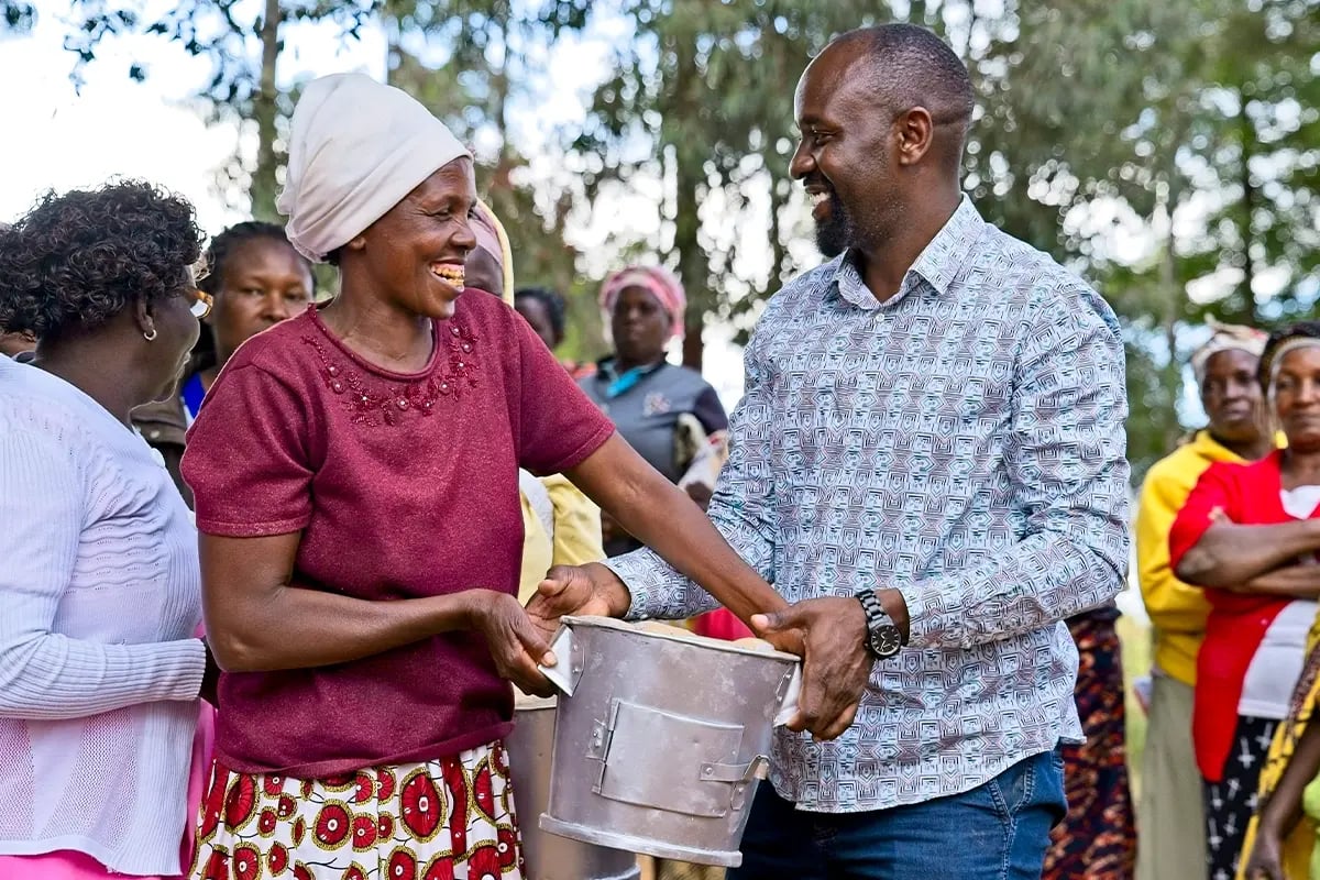 Squiby Foods carbon footprint journey_A DGB team member with the local community in Kenya during cookstoves distribution_visual 3