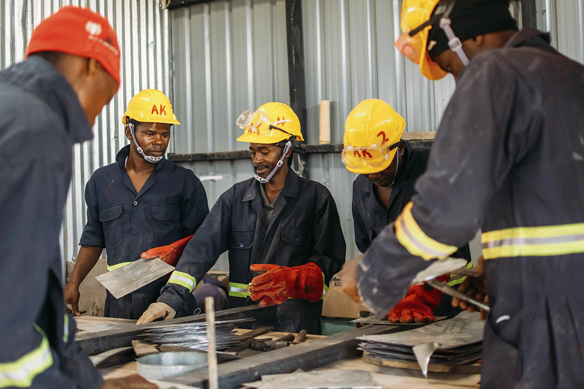 The benefits of nature-based solutions for businesses_Artisans working in a cookstoves factory in Kenya_visual 5